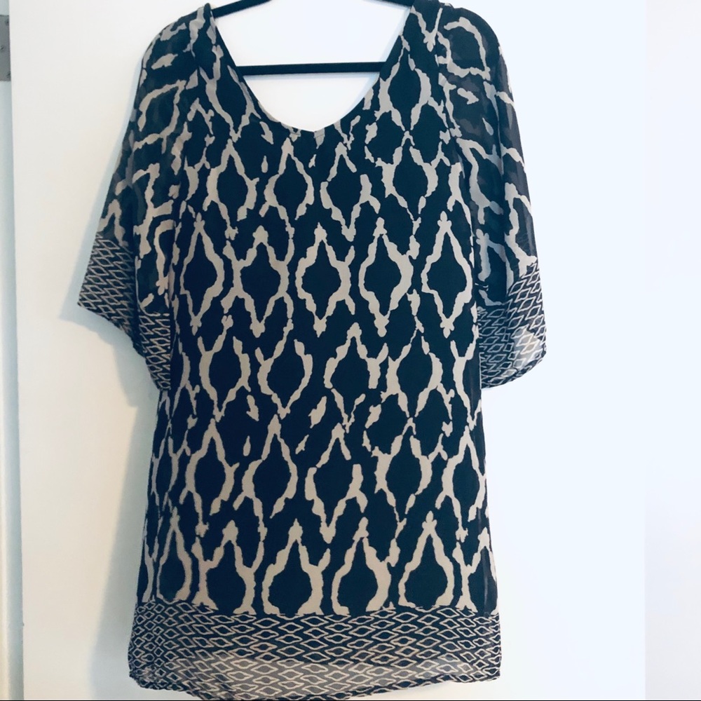 Black and brown pattern dress